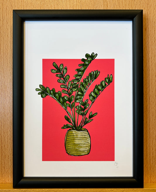 A5 print of a ZZ plant, or Zamioculcas zamifolia,  on a bright pink-red background