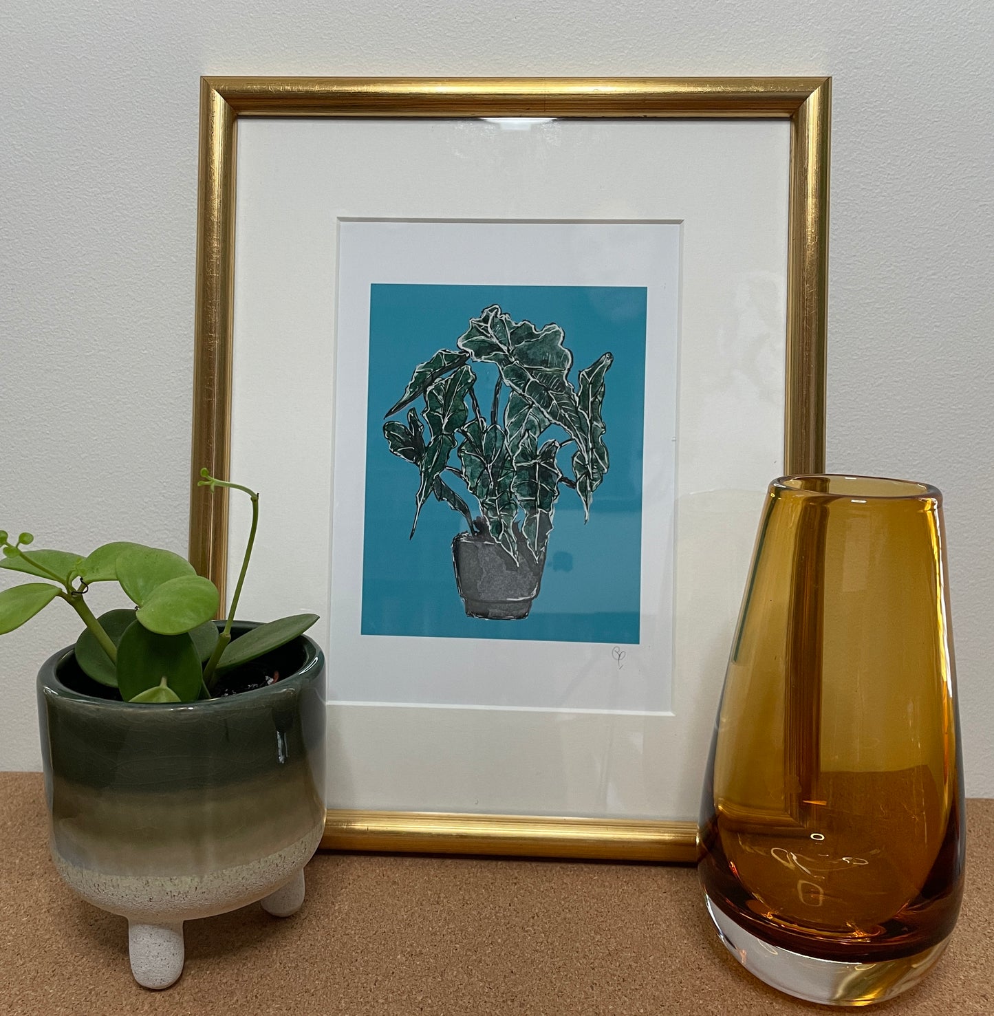 A5 print of an Elephants Ear or Kris plant on a turquoise blue background