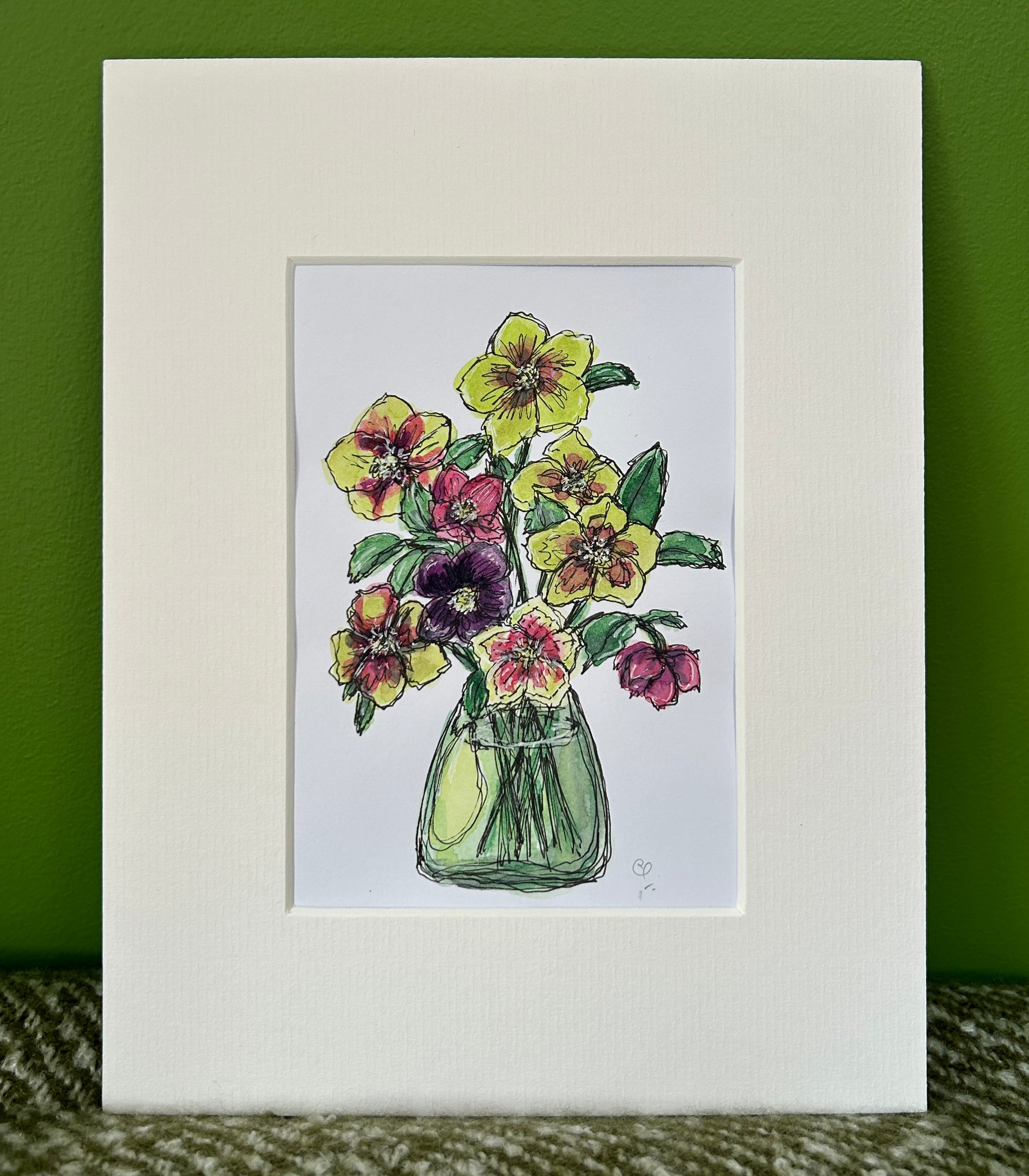 An A6 (postcard sized) watercolour and ink pen illustration of bright hellebore flowers in a green vase.