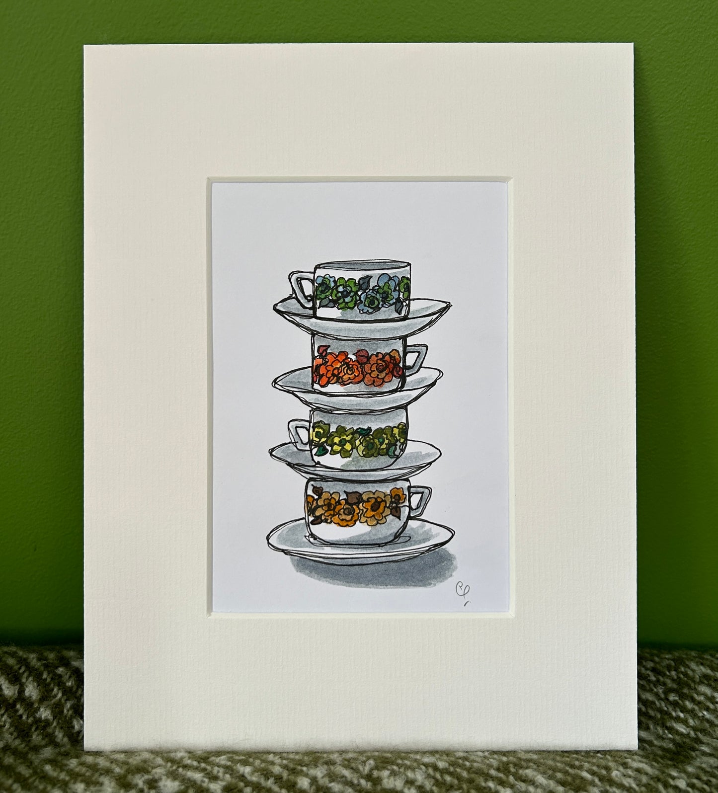 An A6 (postcard sized) watercolour and ink pen single line illustration of a stack of vintage Acropal cups & saucers.