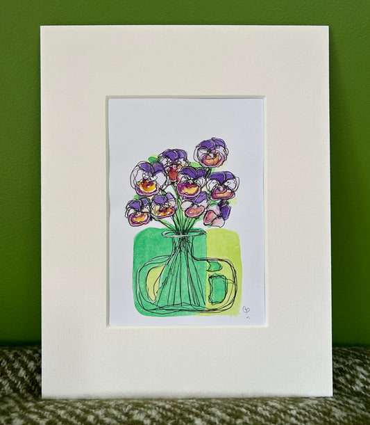 An A6 (postcard sized) watercolour and ink pen illustration of cheerful pansies in a green vase.