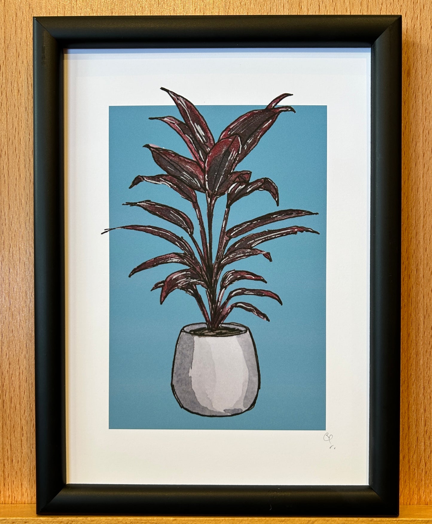 A5 print of a Ti plant on a dusky turquoise background 